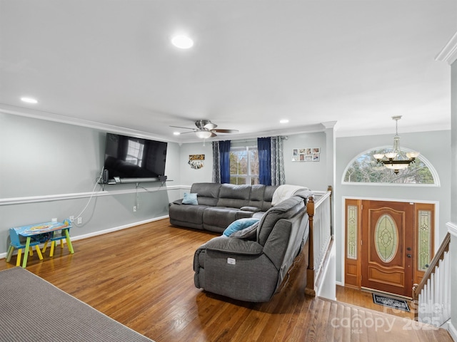 2200 Peninsula Ave, Shelby, NC 28150 - living area with crown molding, wood finished floors, a ceiling fan, a chandelier, and recessed lighting