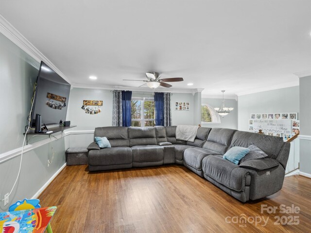 2200 Peninsula Ave, Shelby, NC 28150 - living room with wood finished floors, ornamental molding, a chandelier, ceiling fan, and recessed lighting