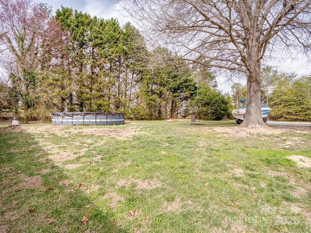 2200 Peninsula Ave, Shelby, NC 28150 - view of grassy yard with a covered pool