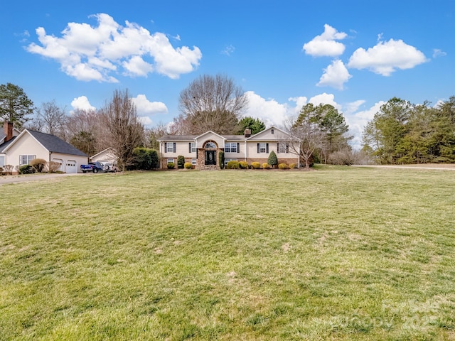 2200 Peninsula Ave, Shelby, NC 28150 - view of front of property with a front lawn, a chimney, and a detached garage