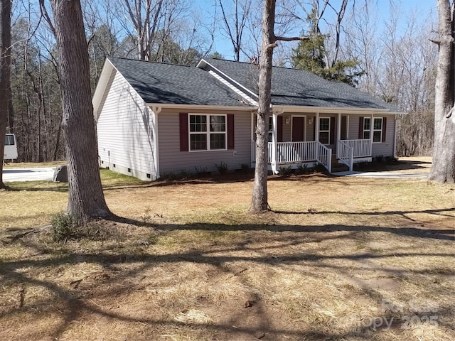 single story home featuring roof with shingles, a porch, crawl space, and a front yard