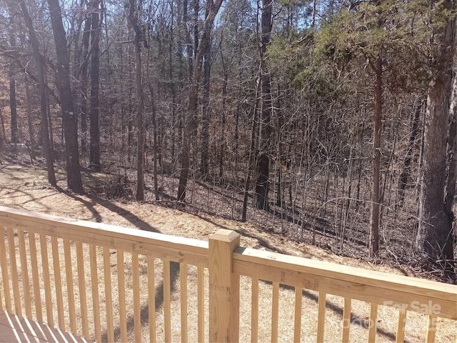 view of yard with a forest view