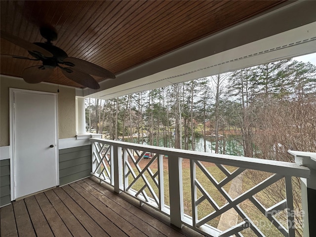 wooden deck with ceiling fan