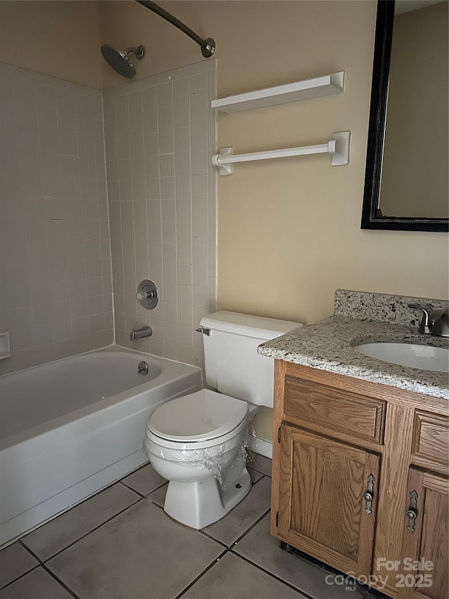 bathroom with toilet, tile patterned flooring, tub / shower combination, and vanity