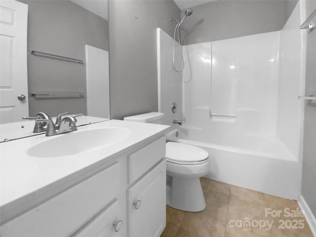 bathroom with shower / washtub combination, tile patterned flooring, vanity, and toilet