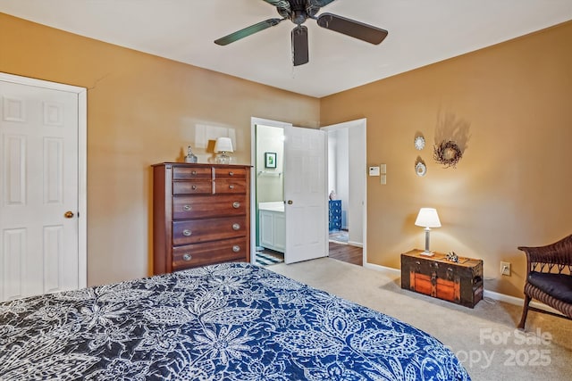 carpeted bedroom featuring a ceiling fan and baseboards