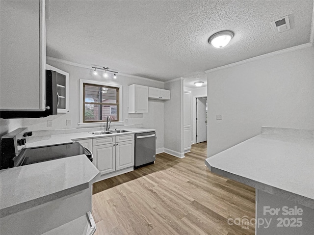 kitchen featuring light wood finished floors, ornamental molding, stainless steel dishwasher, a sink, and range with electric stovetop