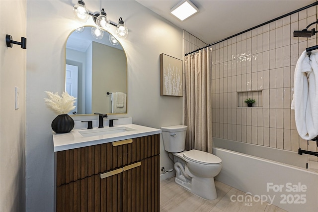 full bathroom with shower / tub combo, toilet, and vanity