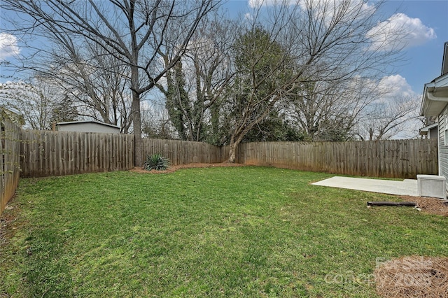 view of yard with a fenced backyard