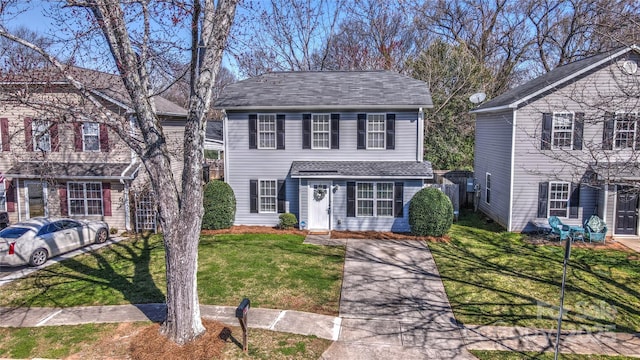 view of front of home featuring a front yard