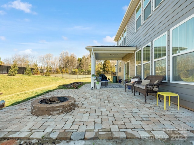 view of patio with a fire pit and a fenced backyard