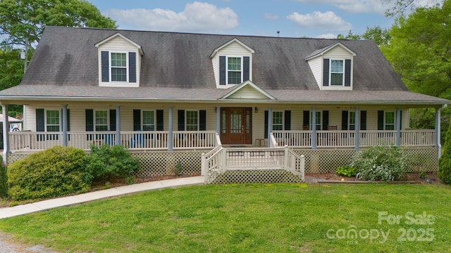 view of front of house featuring covered porch and a front lawn