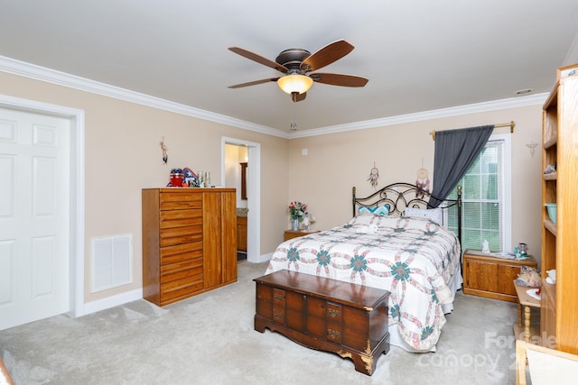 bedroom with ceiling fan, carpet floors, visible vents, baseboards, and crown molding