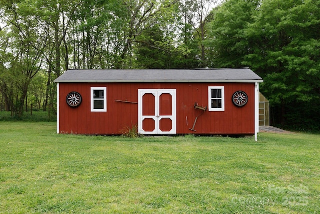 view of outbuilding with an outdoor structure