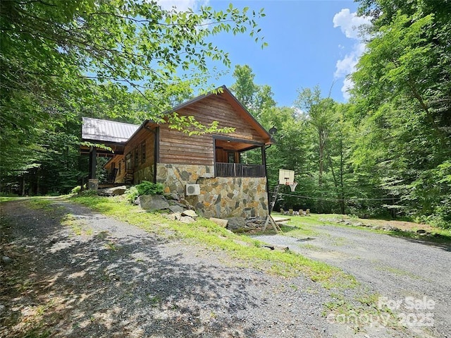 view of outbuilding featuring driveway