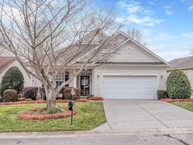 single story home featuring a garage, a front yard, and concrete driveway