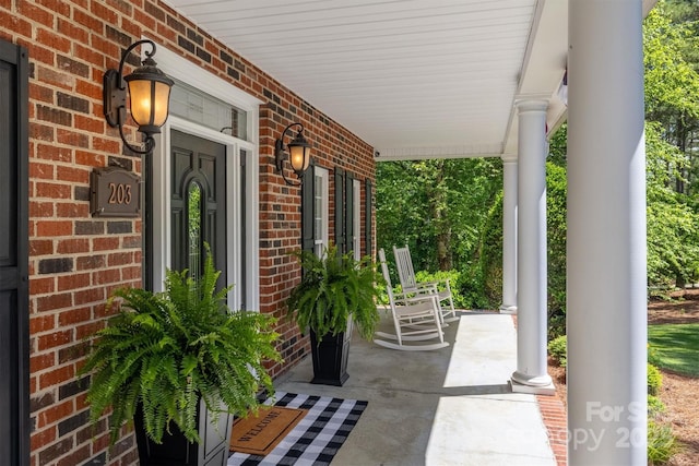 view of patio featuring a porch