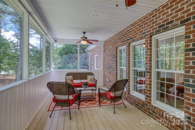 wooden deck with ceiling fan