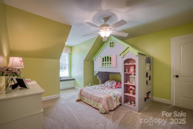 bedroom with carpet floors, ceiling fan, baseboards, and vaulted ceiling