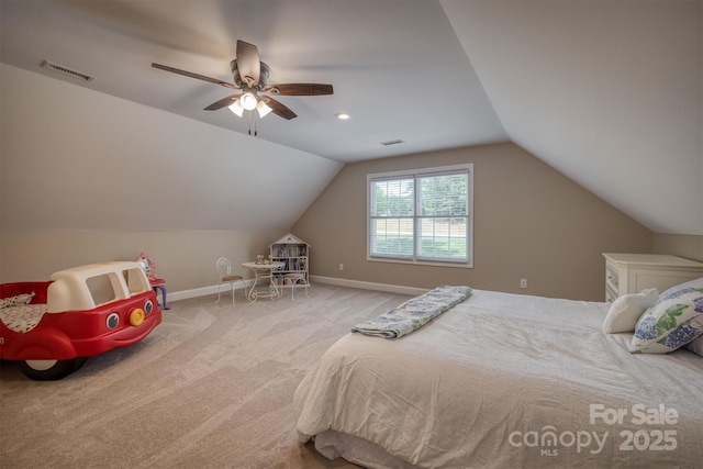 carpeted bedroom with lofted ceiling, visible vents, ceiling fan, and baseboards