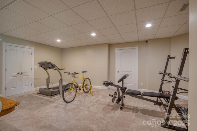 exercise room with recessed lighting, carpet, visible vents, and baseboards