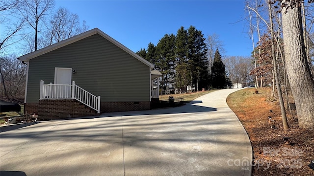 view of side of property with crawl space