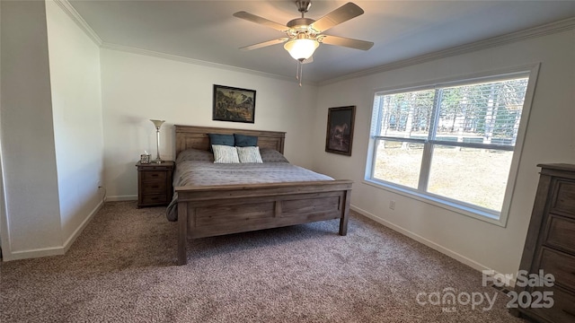 carpeted bedroom featuring ornamental molding, ceiling fan, and baseboards