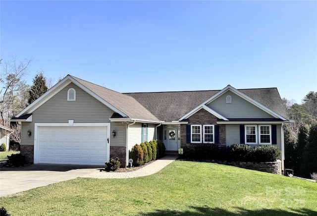 ranch-style house featuring a front lawn, brick siding, driveway, and an attached garage