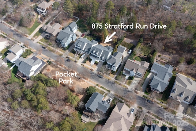 birds eye view of property with a residential view