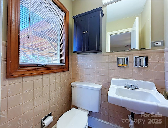 bathroom with a sink and toilet