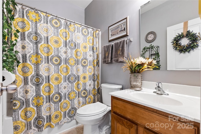 full bathroom with visible vents, toilet, a shower with curtain, tile patterned flooring, and vanity