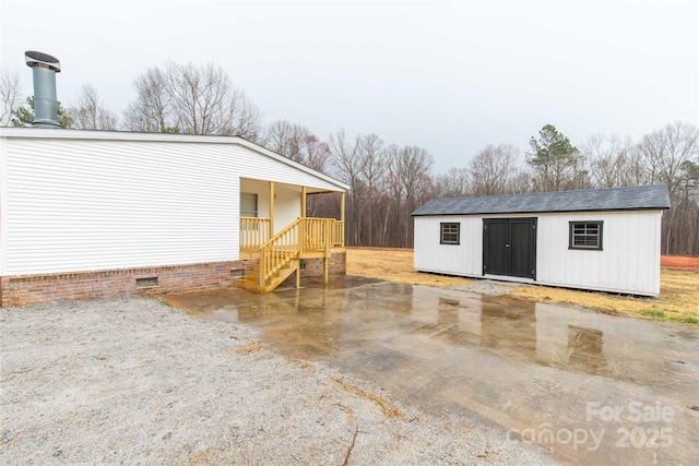 view of outbuilding with an outbuilding