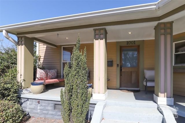 entrance to property with covered porch