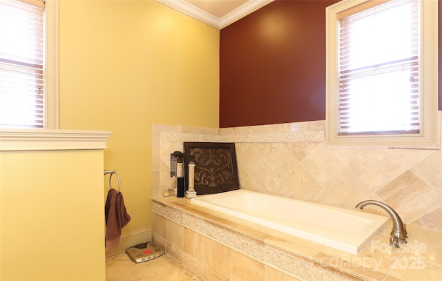 full bath featuring a healthy amount of sunlight, tile patterned floors, a bath, and crown molding