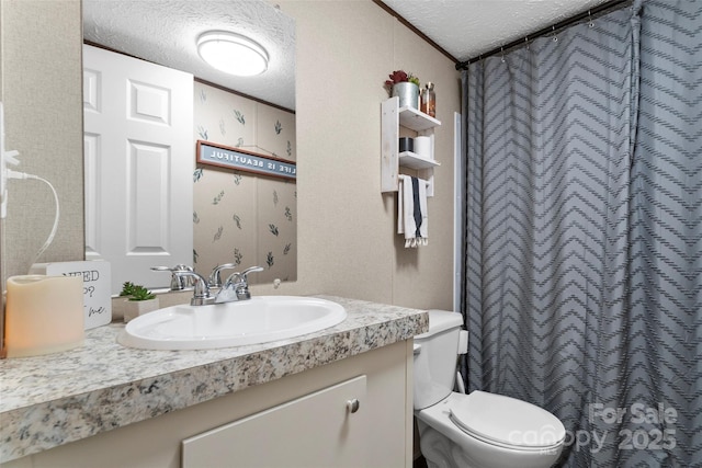 full bath with toilet, curtained shower, a textured ceiling, and vanity