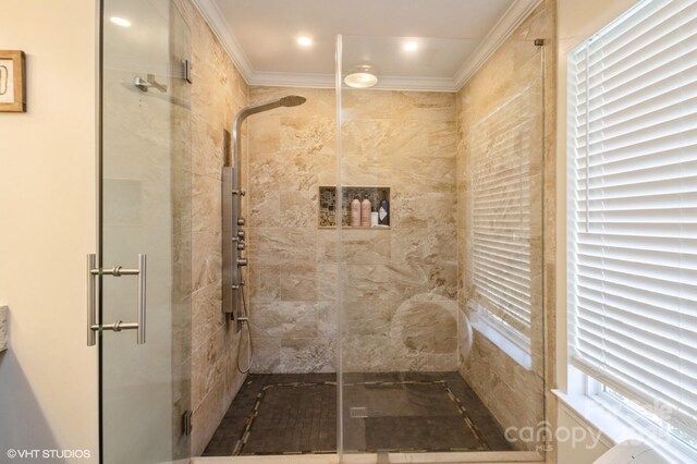 full bath with ornamental molding, a shower stall, and recessed lighting