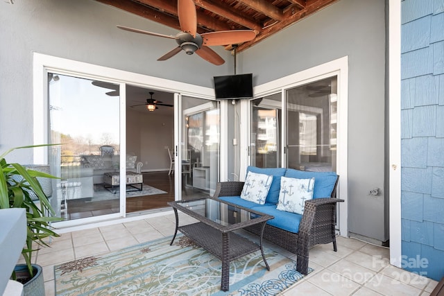 view of patio featuring a ceiling fan