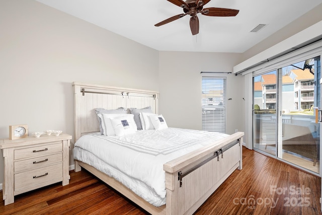 bedroom with ceiling fan, dark wood-type flooring, visible vents, and access to exterior