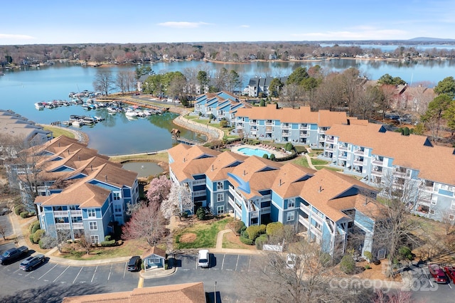 birds eye view of property featuring a water view