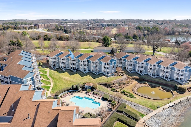 drone / aerial view with a water view