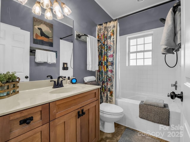 full bathroom featuring vanity, toilet, and tiled shower / bath combo