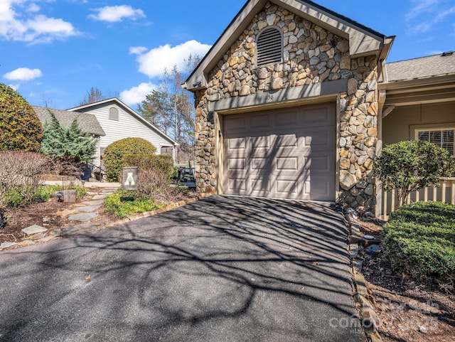 garage featuring driveway