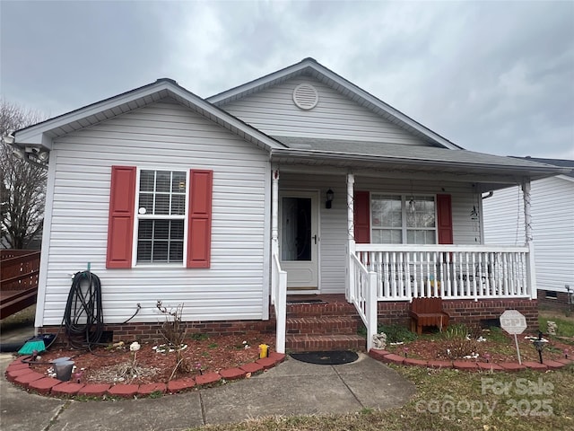 bungalow-style house featuring crawl space and covered porch