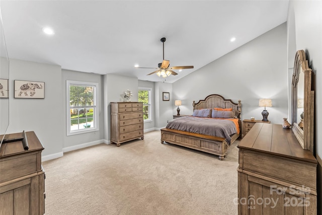 bedroom with a ceiling fan, recessed lighting, baseboards, and light carpet