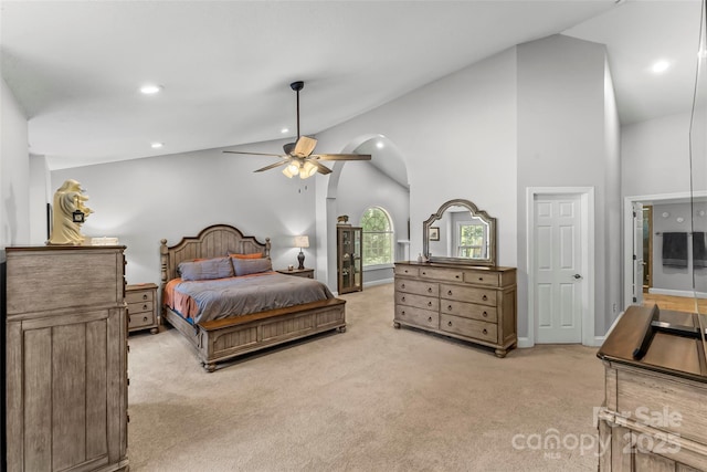 bedroom with a ceiling fan, high vaulted ceiling, recessed lighting, and light carpet