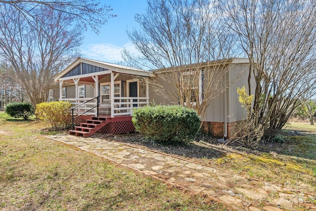 view of front of property featuring covered porch