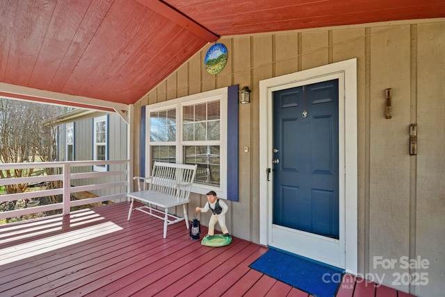 entrance to property featuring a porch