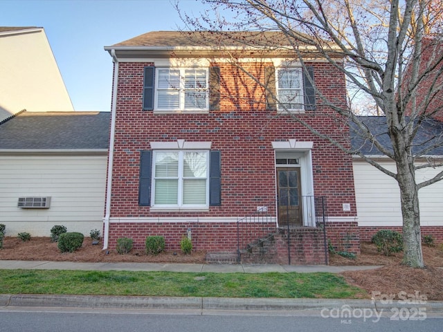 view of front facade with brick siding