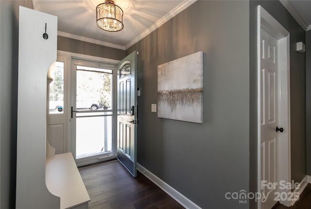 entryway with baseboards, a healthy amount of sunlight, dark wood-style floors, and crown molding