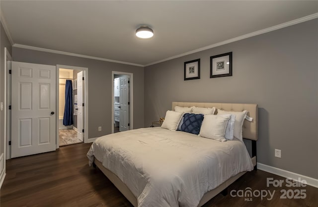 bedroom featuring baseboards, wood finished floors, and ornamental molding